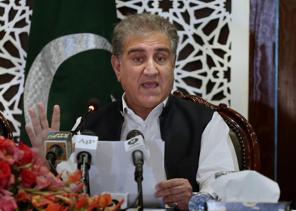 Pakistan Foreign Minister Shah Mahmood Qureshi speaks to reporters at the Foreign Ministry in Islamabad, Pakistan, Monday, Aug. 24, 2020. Qureshi told reporters he would meet with a Taliban delegation on Tuesday. Islamabad's role was only to "facilitate the peace process" but it's up to Afghans to decide the way forward, he said. A Taliban political team arrived in Pakistan on Monday. (AP Photo/Anjum Naveed)