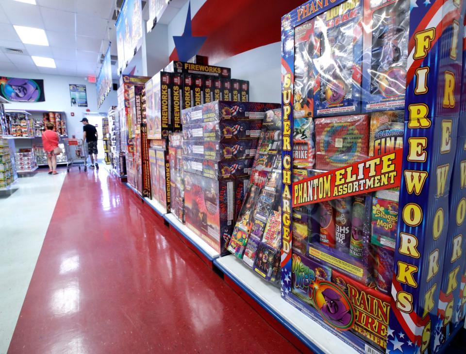 Customers stroll the aisles at Phantom Fireworks on South Atlantic Avenue in Daytona Beach. Interest in home fireworks remains strong this  summer following a significant jump in the wake of COVID-related cancellations of large gatherings two years ago, according to retailers.