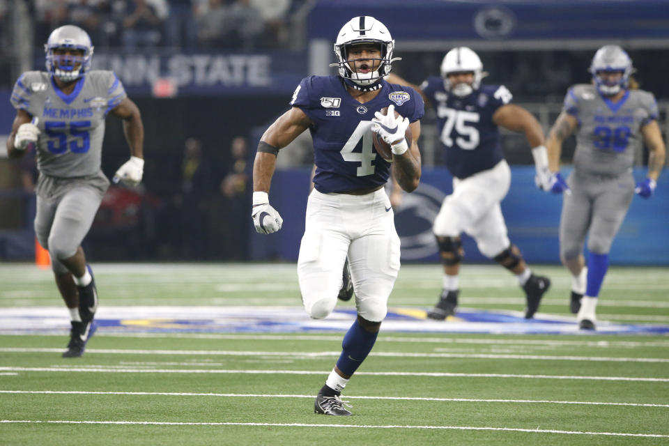 Penn State running back Journey Brown (4) carries the ball to the end zone for a touchdown against Memphis in the first half of the NCAA Cotton Bowl college football game, Saturday, Dec. 28, 2019, in Arlington, Texas. (AP Photo/Ron Jenkins)