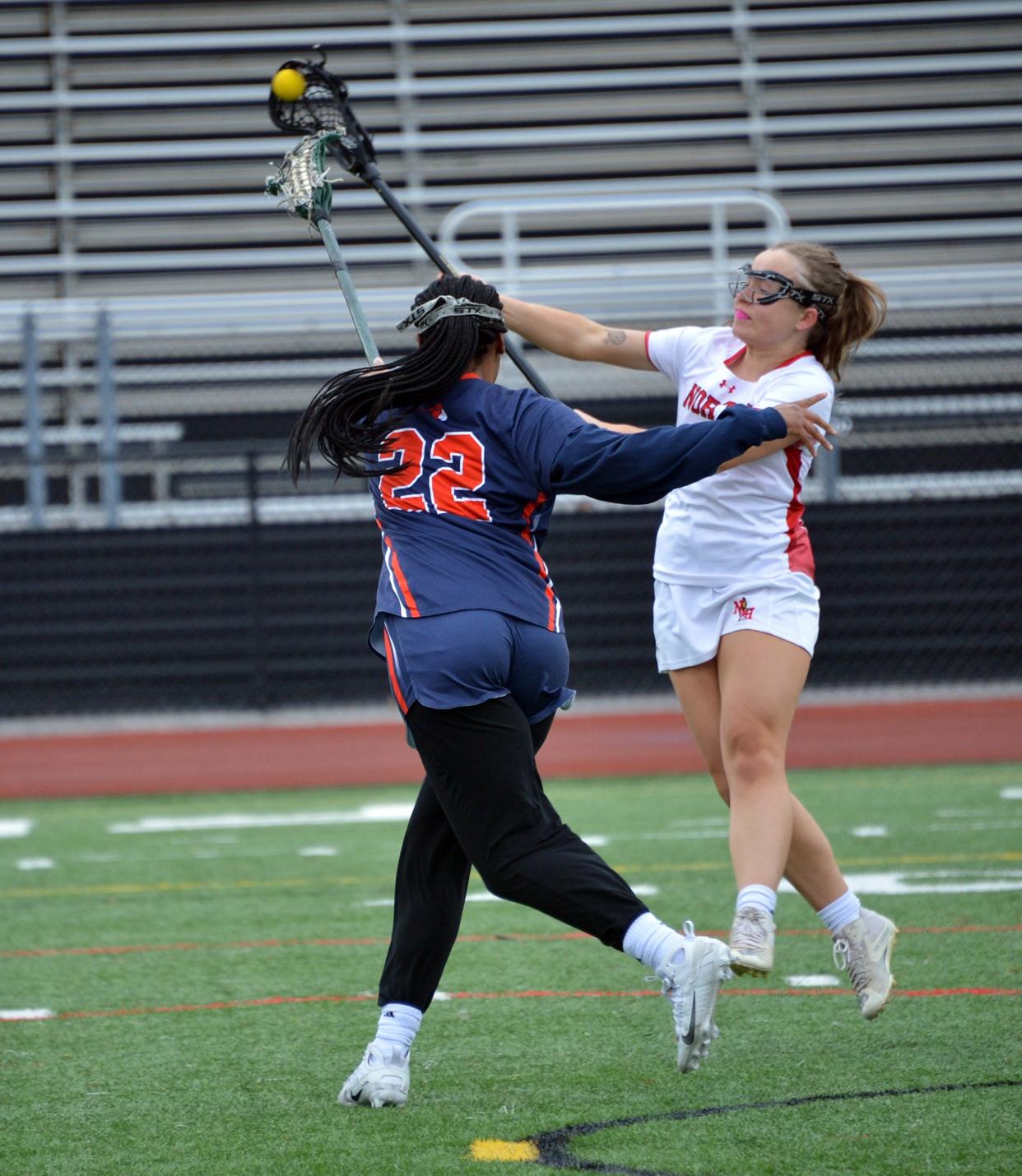 North Hagerstown's Sydney Emerson makes a pass upfield against Baltimore Poly.