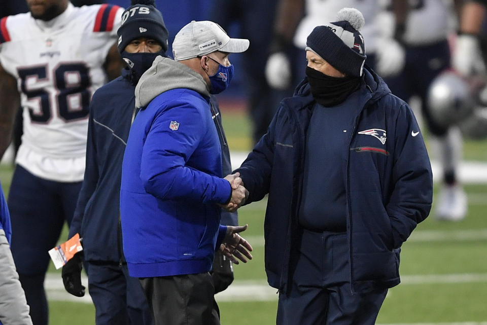 New England Patriots' Bill Belichick, right, shakes hands with Buffalo Bills' Sean McDermott after an NFL football game Sunday, Nov. 1, 2020, in Orchard Park, N.Y. The Bills won 24-21. (AP Photo/Adrian Kraus)