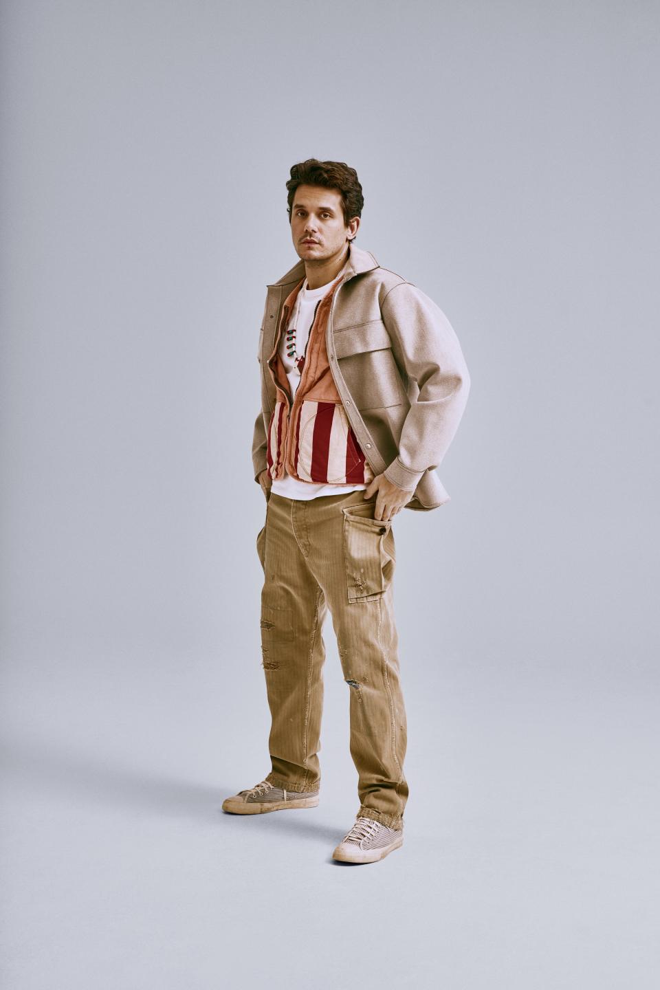 <cite class="credit">Ultrasuede shirt jacket, by Fear of God / Vest (S/S '19), Sublig crew tee, Veterans pants (2019), and Jaipur Hi-Hickory sneakers (2009), by Visvim / Necklace, by Kapital</cite>