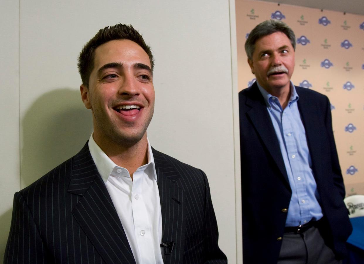 Ryan Braun talks about winning the NL Rookie of the Year award on Nov. 13, 2007, as former Brewers GM Doug Melvin looks on after a news conference.