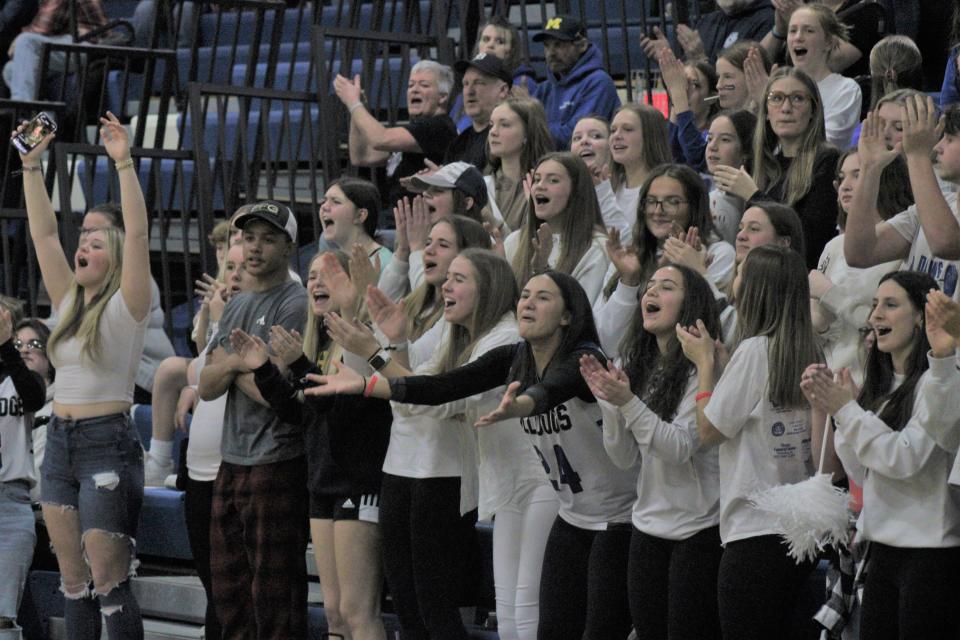 The Inland Lakes student section celebrates a basket during the fourth quarter of Tuesday's Ski Valley showdown against Gaylord St. Mary.