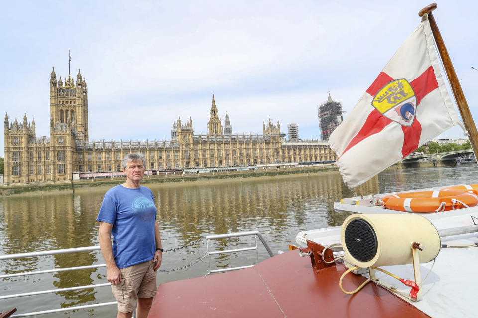 Danny Collier stands on deck aboard his boat, the Princess Freda on the river Thames in front of the Houses of Parliament in London, Friday, May 8, 2020. Danny and his brother John Collier are the proud owners of the boats the Princess Freda, the Queen Elizabeth, the Connaught and the Clifton Castle. All four boats have had their moment in the sun. And all four were meant to have another on Friday as Britain celebrates the 75-year anniversary of Victory in Europe Day. Instead, they're lying idle on the banks of the River Thames, not far from Kew Gardens in southwest London, as the festivities surrounding VE Day have been all but cancelled as a result of the coronavirus pandemic. For the brothers it’s nothing less than a disaster, one that could spell the demise of the company their late father created in 1975. (AP Photo/ Vudi Xhymshiti)