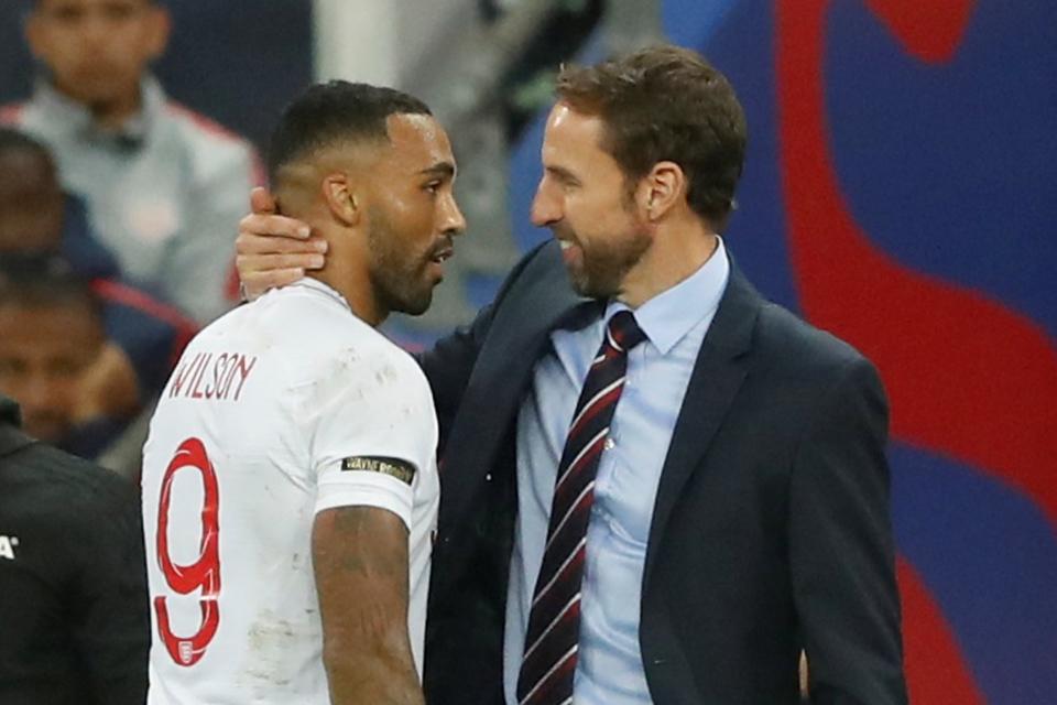 On target: Southgate congratulates Wilson after his debut goal at Wembley: Action Images via Reuters