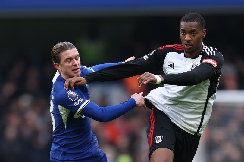 Conor Gallagher of Chelsea and Tosin Adarabioyo of Fulham during the Premier League match between Chelsea FC and Fulham FC at Stamford Bridge on January 13, 2024 in London, England..