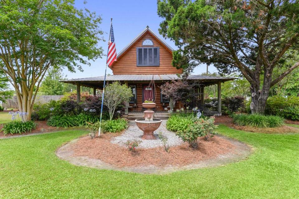 The Waveland home Breezy Porches got its name from the porch that wraps around the house, rebuilt in the footprint of the 1940s bungalow that originally sat there and was heavily damaged by Hurricane Katrina. Owners Glenn Hood and Charles Underwood also added a second story and a galvanized aluminum roof. MS Real Estate Photography