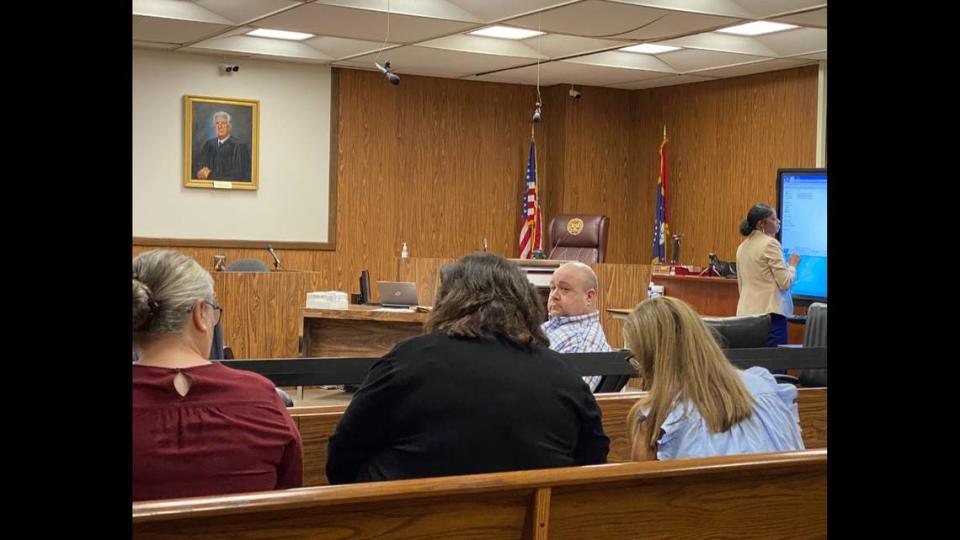 Jeremy Childress looks back at his relatives during his first-degree murder trial in Harrison County Circuit Court in Gulfport. Childress is accused in the domestic-violence killing of his girlfriend, Michelle Hester, in August 2021..