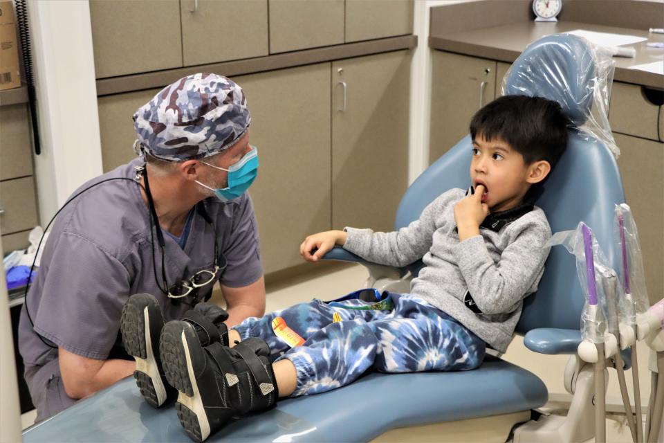 Somewhere between 50 and 60 patients were expected to be treated during the 20th annual Give Kids a Smile free dental clinic at San Juan College's Health and Human Performance Center on Friday, Feb. 3.