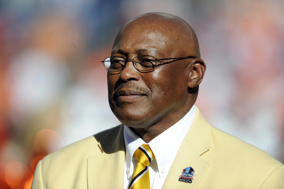 FILE - In this Sept. 26, 2010 file photo, former Denver Broncos running back Floyd Little speaks during the halftime of an NFL football game between the Indianapolis Colts and the Denver Broncos n Denver. Little, the Hall of Fame running back who starred at Syracuse and for the Denver Broncos, has died. The Pro Football Hall of Fame said he died Friday, Jan. 1, 2021. (AP Photo/ Jack Dempsey, File )