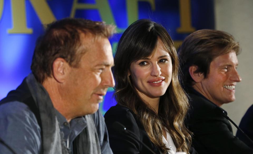 Actors, from left, Kevin Costner, Jennifer Garner and Denis Leary appear at a news conference for the movie "Draft Day" in New York on Friday, Jan. 31, 2014. The Seattle Seahawks play the Denver Broncos on Sunday at the stadium in the NFL Super Bowl XLVIII football game. (AP Photo/Paul Sancya)