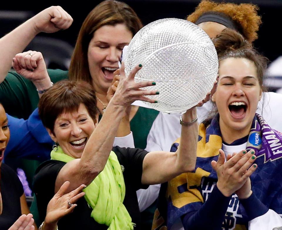 Notre Dame head coach Muffet McGraw celebrates after defeating Mississippi State in the final of the women's NCAA Final Four college basketball tournament, Sunday, April 1, 2018, in Columbus, Ohio. Notre Dame won 61-58. Notre Dame won 61-58. (AP Photo/Ron Schwane)