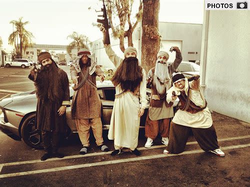 Chris Brown (centre) in costume with his 'clique'. Photo: Twitter <b>GALLERY:</b> Celebrity Halloween costumes of 2012