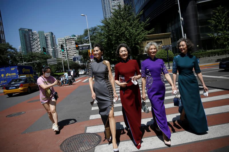 Elderly model group "Glamma Beijing" perform catwalk in Beijing's CBD area following the coronavirus disease (COVID-19) outbreak