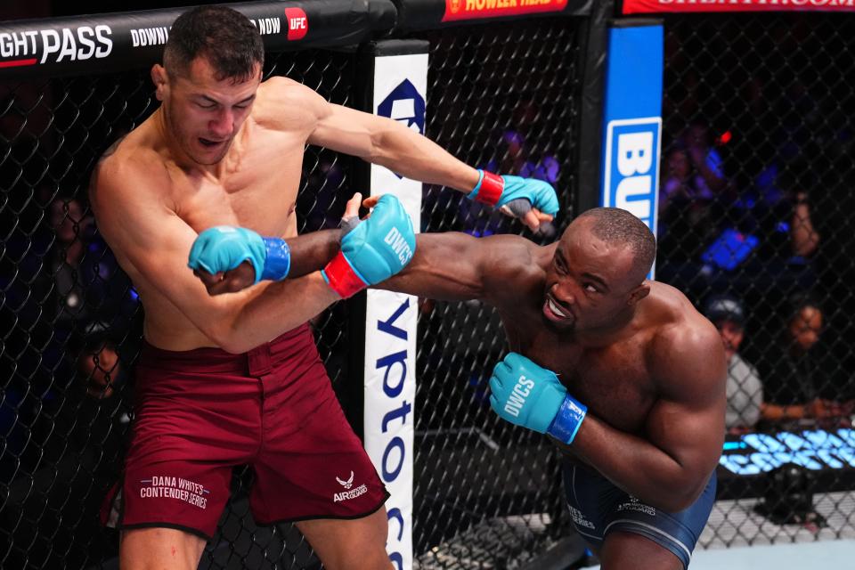 LAS VEGAS, NEVADA - AUGUST 20: (R-L) Torrez Finney punches Cam Rowston of Australia in a middleweight fight during Dana White's Contender Series, season eight week two on August 20, 2024 in Las Vegas, Nevada. (Photo by Chris Unger/Zuffa LLC)