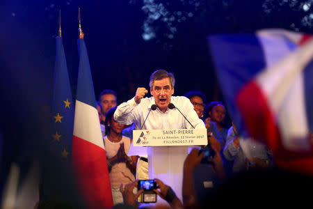 Francois Fillon, former French prime minister, member of The Republicans political party and 2017 presidential candidate of the French centre-right, attends a political rally in Saint-Pierre as he campaigns on the French Indian Ocean island of the Reunion, February 12, 2017. REUTERS/Laurent Capmas