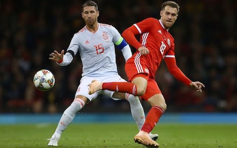 Aaron Ramsey playing for Wales in their 4-1 thrashing by Spain - Credit: afp