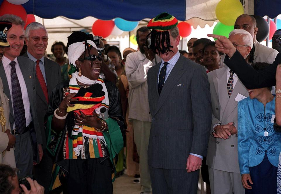 King Charles (then Prince of Wales) wears a hat the wrong way while visiting Jamaica