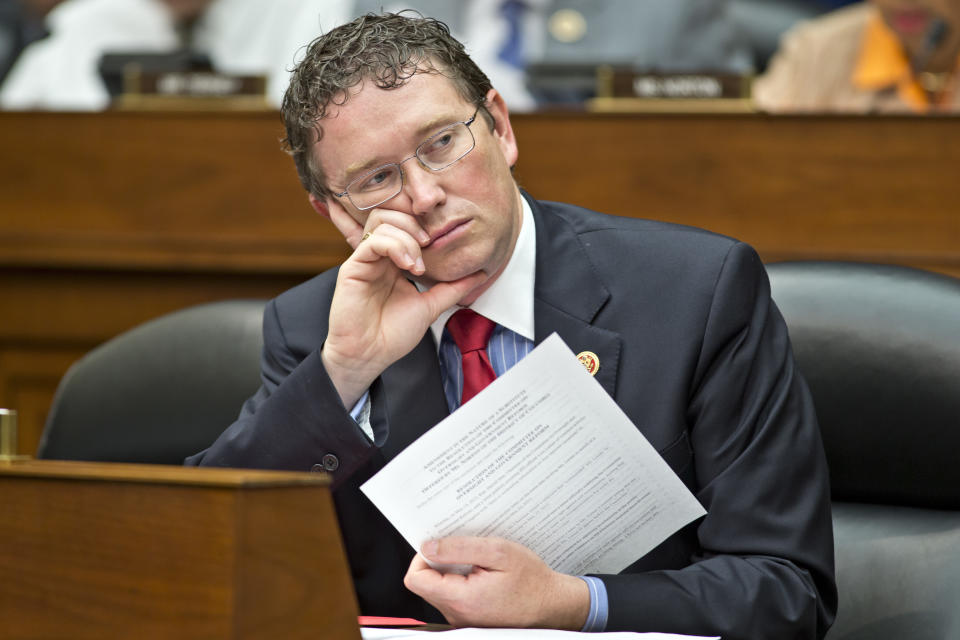 FILE - In this June 28, 2013, file photo, Rep. Thomas Massie, R-Ky., listens during a House Oversight Committee hearing on Capitol Hill in Washington. A vocal group of congressional Republicans, including Massie, and Democrats are reprimanding President Donald Trump for launching the cruise missile attack against Syria without first getting Capitol Hill’s approval. (AP Photo/J. Scott Applewhite, File)