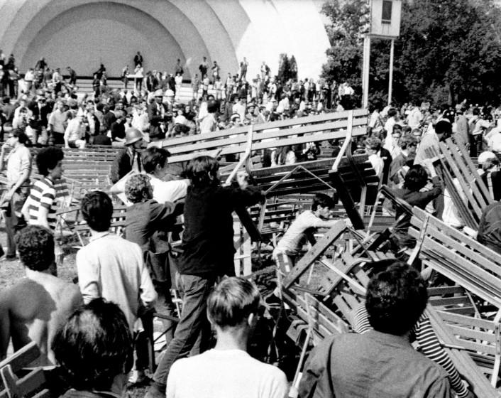 Long haired and bearded Hippies and Yippies use park benches at Grant Park's Band Shell to construct a barricade against Chicago police and National Guardsmen in Chicago on August 28, 1968. The confrontation left many injured and arrested. Grant Park is at the edge of downtown Chicago near the Conrad Hilton Hotel. The hotel is the headquarters for the Democratic National Convention now in session in Chicago. (AP Photo)
