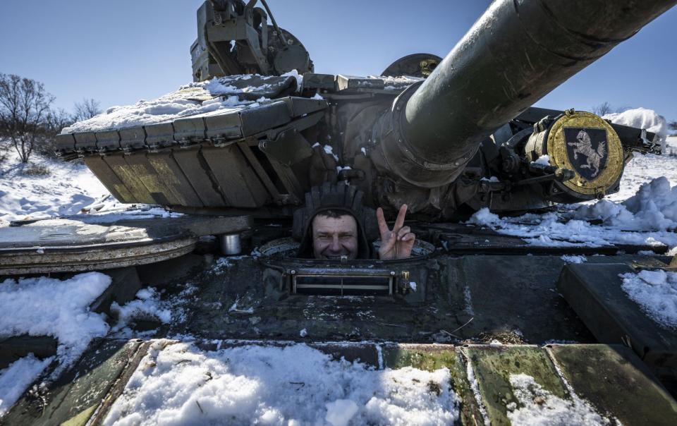 A Ukrainian soldier in a snow-covered tank in Donetsk - Muhammed Enes Yildirim/Anadolu Agency 