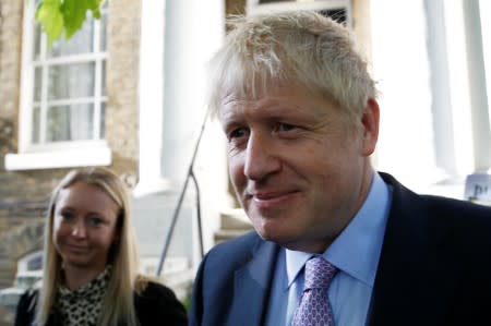 PM hopeful Boris Johnson leaves his home in London