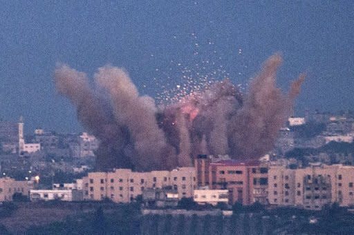 A picture taken from the southern Israeli town of Sderot shows smoke billowing from a spot targeted by an Israeli air strike inside the Gaza strip on November 15. Even as the funeral of Hamas military chief Ahmed Jaabari was being held, Israeli raids continued, with the toll from more than 22 hours of strikes rising to 16 dead