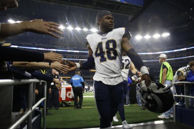 Los Angeles Rams linebacker Travin Howard (48) walks off the field after an NFL football game against the Dallas Cowboys in Arlington, Texas, Sunday, Dec. 15, 2019. (AP Photo/Roger Steinman)