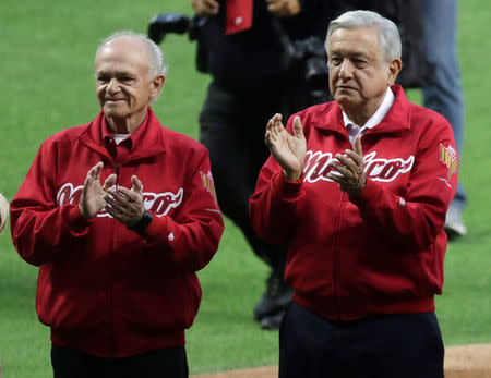 Mexico's President Andres Manuel Lopez Obrador and Diablos Rojos Chairman Alfredo Harp Helu during the opening celebrations of the Alfredo Harp Helu Stadium in Mexico City, Mexico March 23, 2019. REUTERS/Henry Romero