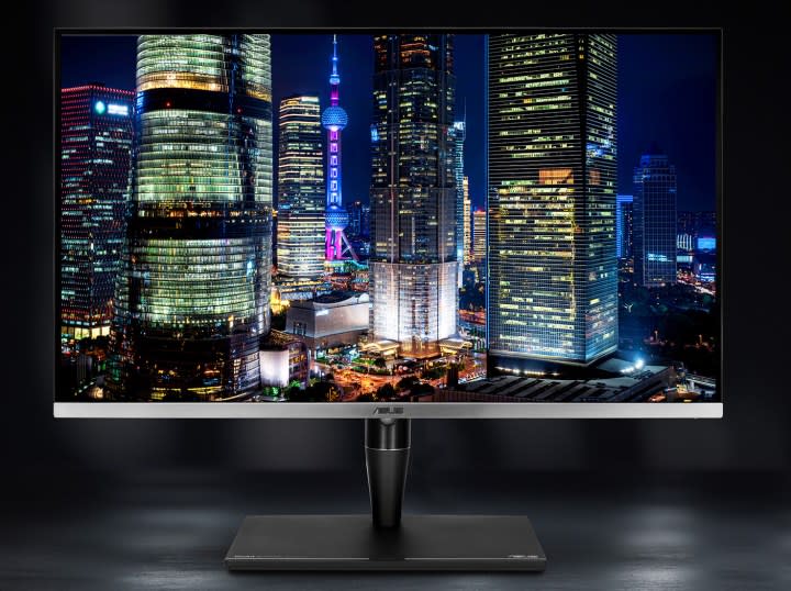 The ProArt Mini-LED monitor on a grey table.