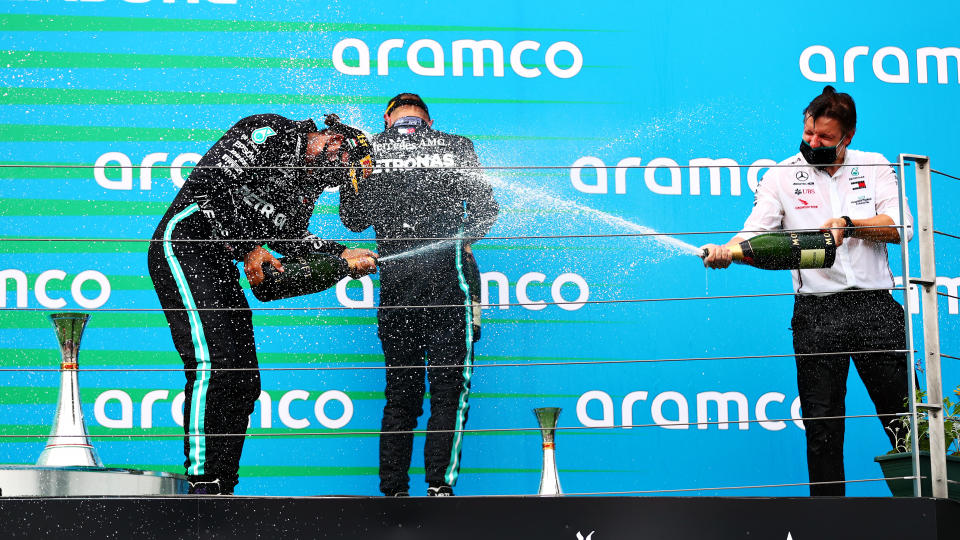 BUDAPEST, HUNGARY - JULY 19: Race winner Lewis Hamilton of Great Britain and Mercedes GP celebrates on the podium during the Formula One Grand Prix of Hungary at Hungaroring on July 19, 2020 in Budapest, Hungary. (Photo by Dan Istitene - Formula 1/Formula 1 via Getty Images)