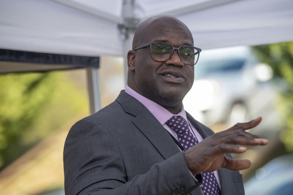 Basketball Hall of Famer Shaquille O'Neal speaks at a press conference in McDonough, Ga., Friday, Jan. 22, 2021, after being named Henry County Sheriff's Office Director of Community Relations by Henry County Sheriff Reginald Scandrett. (Alyssa Pointer/Atlanta Journal-Constitution via AP)