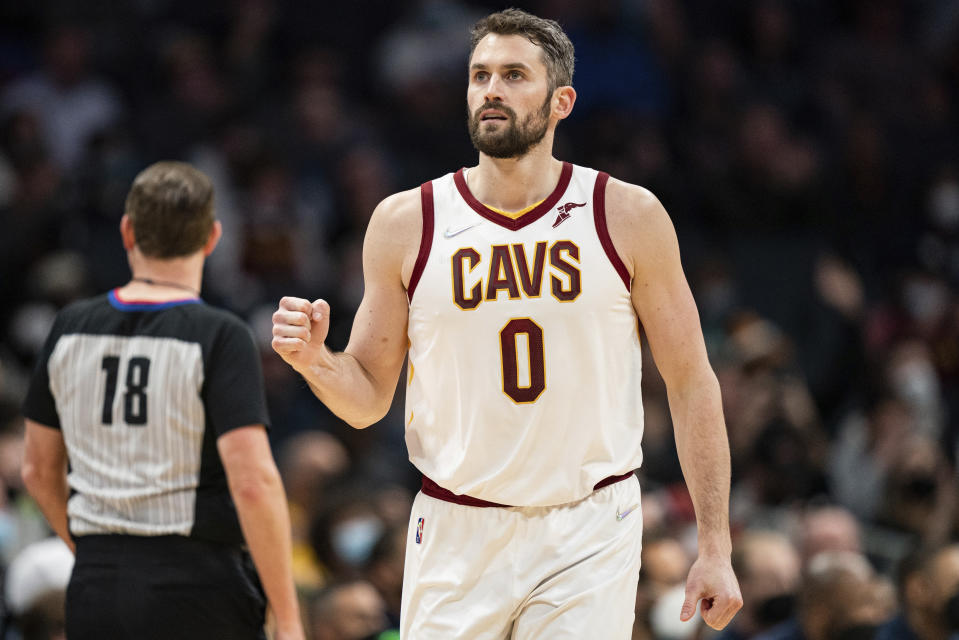 Cleveland Cavaliers forward Kevin Love reacts during the first half of an NBA basketball game against the Charlotte Hornets in Charlotte, N.C., Friday, Feb. 4, 2022. (AP Photo/Jacob Kupferman)