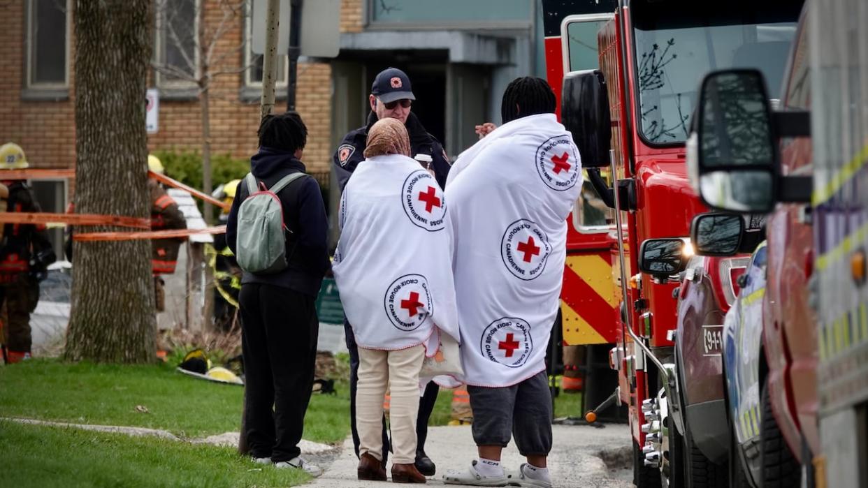The 37 people staying at the shelter that caught fire are being cared for by the Red Cross. (Simon-Marc Charron/Radio-Canada - image credit)