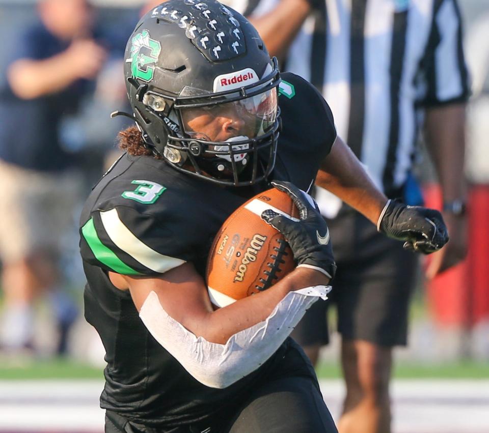 Cole Tabb runs during the Choctaw Niceville spring football game at Steve Riggs Stadium.