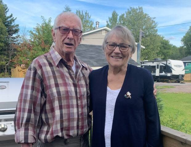 David and Minnie Clarke were separated when they entered long-term care after 61 years together. Now their daughter, Elizabeth Penney, says she wants to see changes to keep it from happening to anyone else. (Submitted by Elizabeth Penney - image credit)