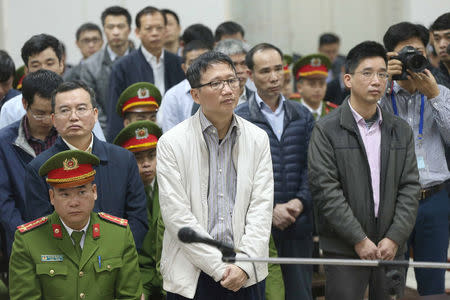 PVC's former chairman Trinh Xuan Thanh (C) listens during verdict session at a court in Hanoi, Vietnam January 22, 2018. VNA/Doan Tan via REUTERS