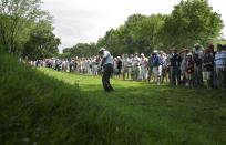 FILE - In this June 12, 2006, file photo, Tiger Woods hits from the rough on the fifth hole during a practice round for the U.S. Open golf tournament at Winged Foot Golf Club in Mamaroneck, N.Y. Woods returns to Winged Foot for the U.S. Open next week. It's the site of his first missed cut in a major. (AP Photo/Mel Evans, File)