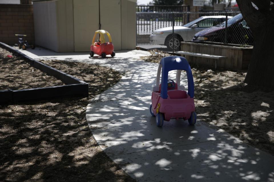 This April 14, 2014 photo shows two toy in the playground at Community Day Preschool of Garden Grove, in Garden Grove, Calif. According to the school's executive director Sue Puisis, the enrollment at the preschool has dropped by more than 50 percent since 2008. The financial crisis that followed the collapse of U.S. investment bank Lehman Brothers in 2008 sent birth rates tumbling around the world as couples found themselves too short of money or too fearful about their finances to have children. Six years later, birth rates haven't bounced back. (AP Photo/Jae C. Hong)