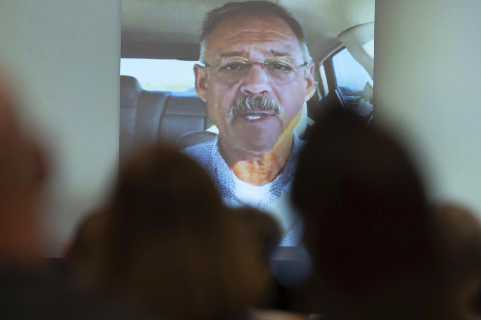 Mark Finchem, candidate for Arizona Secretary of State, speaks via video chat during the Nebraska Election Integrity Forum on Saturday, Aug. 27, 2022, in Omaha, Neb. (AP Photo/Rebecca S. Gratz)