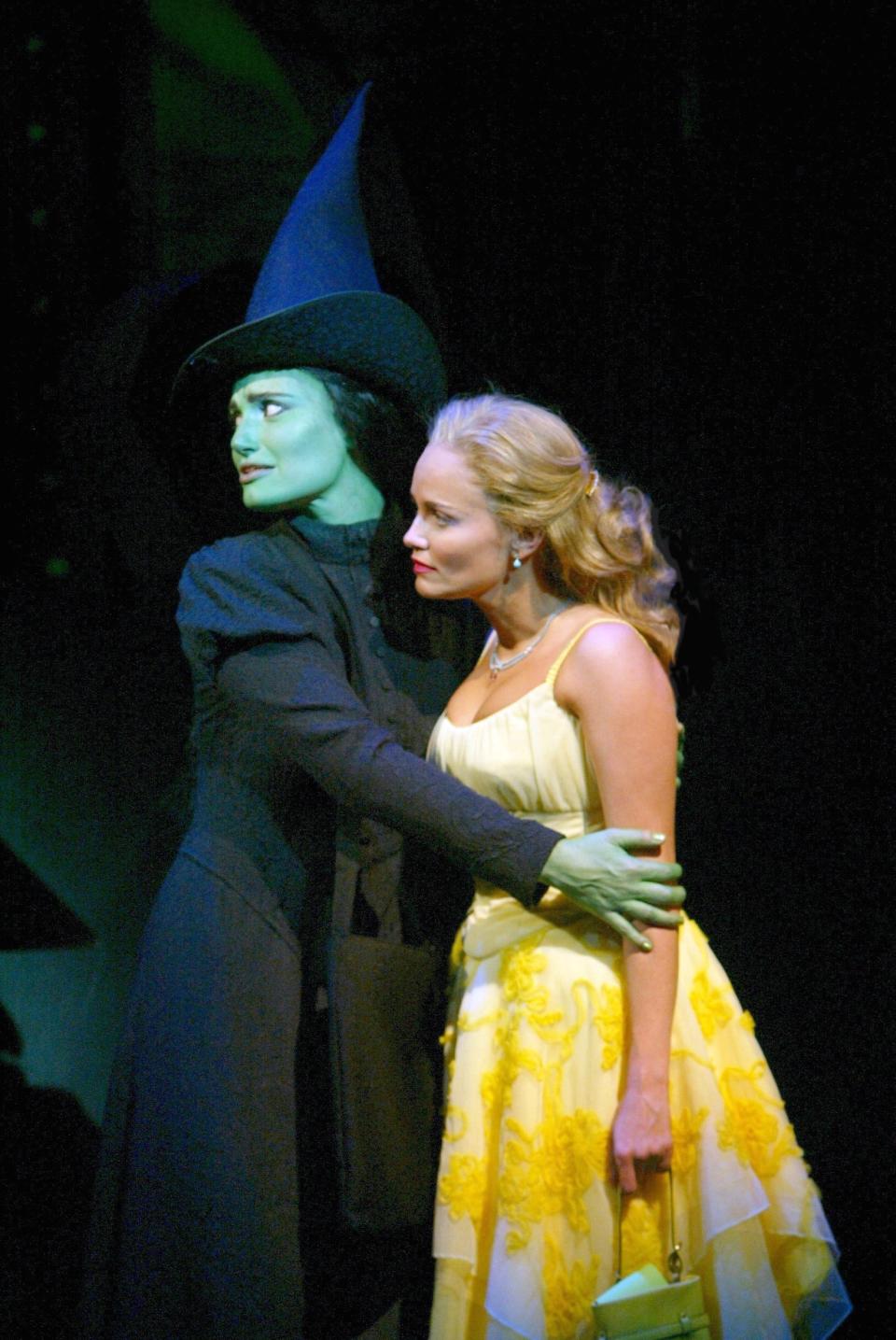 Idina Menzel, left, and Kristin Chenoweth in Broadway musical "Wicked" in 2003.