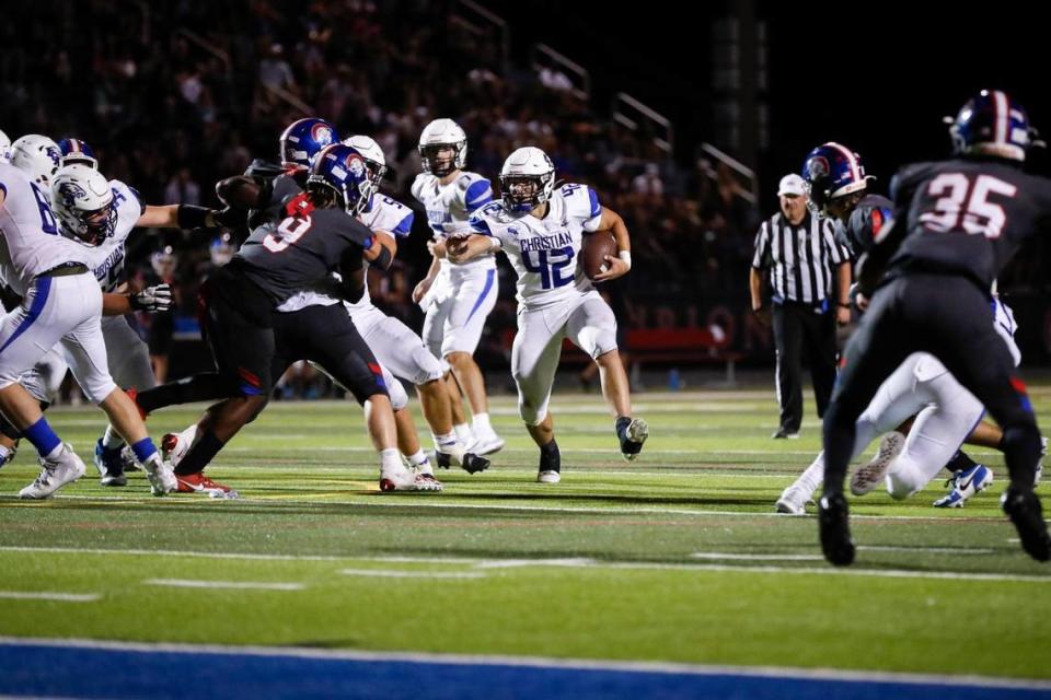 Lexington Christian’s Brady Hensley (42) runs the ball during a win at Christian Academy-Louisville on Sept. 8.