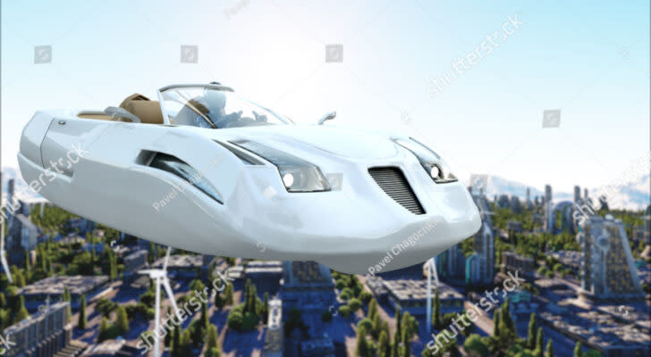 A rendering of a futuristic flying car hovering over a city.