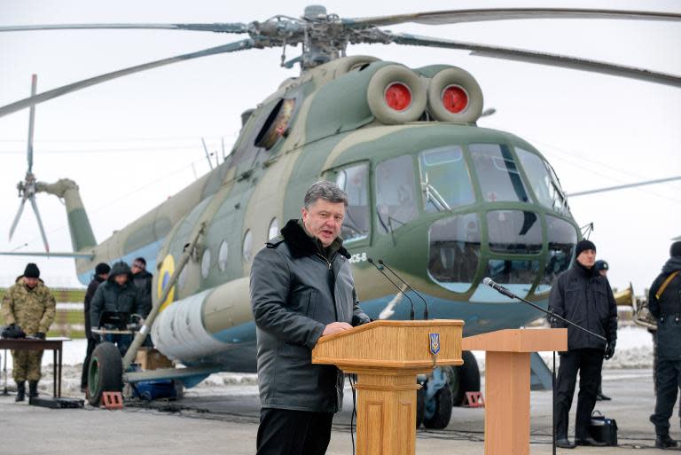 Ukraine's President Petro Poroshenko, pictured on December 6, 2014 in the eastern region of Kharkiv, is targeting the defence ministry in his drive to root out graft