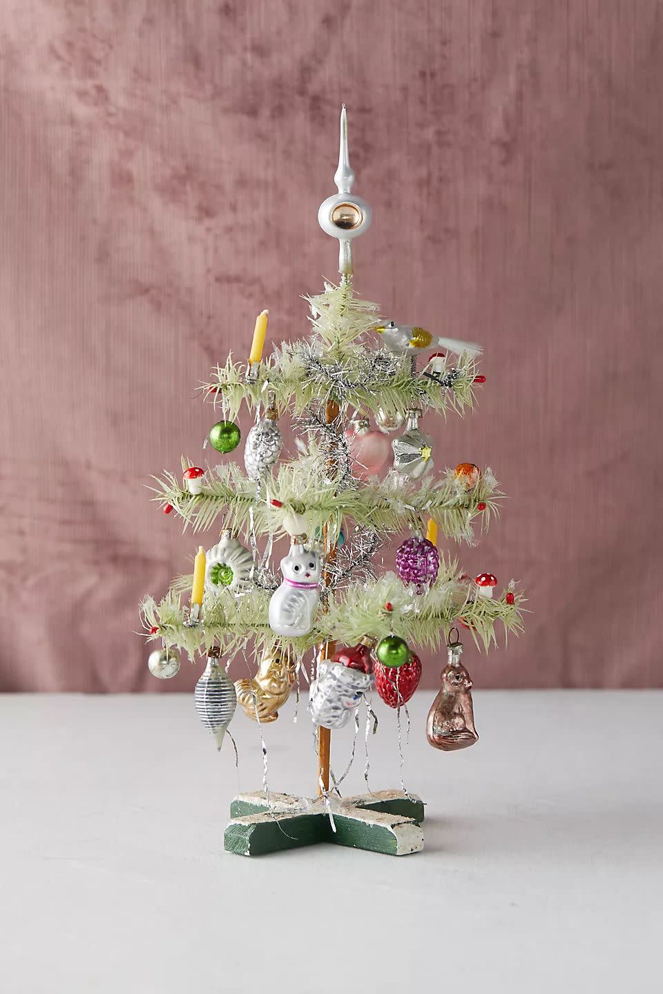 <p><a href="https://go.redirectingat.com?id=74968X1596630&url=https%3A%2F%2Fwww.anthropologie.com%2Fshop%2Fdecorated-feather-mini-christmas-tree2&sref=https%3A%2F%2Fwww.housebeautiful.com%2Fentertaining%2Fholidays-celebrations%2Fg45571408%2Fugly-christmas-trees%2F" rel="nofollow noopener" target="_blank" data-ylk="slk:Shop Now;elm:context_link;itc:0;sec:content-canvas" class="link ">Shop Now</a></p><p>Decorated Feather Mini Christmas Tree</p><p>anthropologie.com</p><p>$228.00</p><span class="copyright">Anthropologie</span>