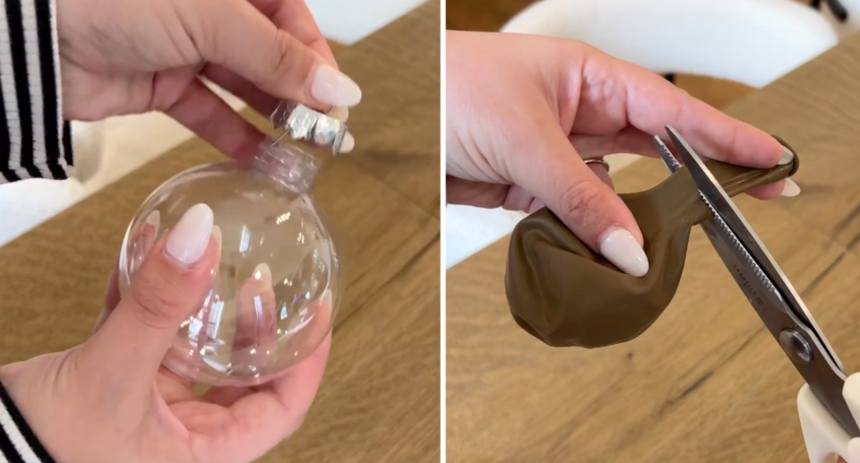 Clear Christmas bauble; Balloon being cut