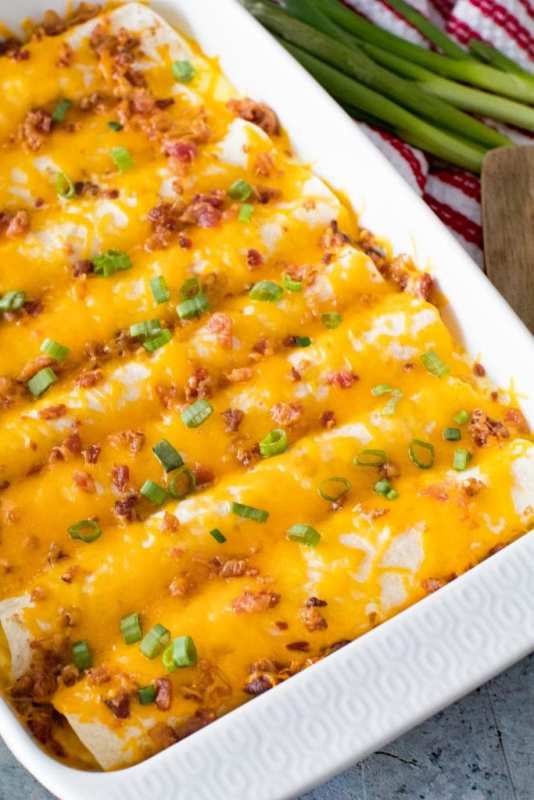 <p>Julie's Eats and Treats</p><p>Perfect for the dad who loves Mexican food. Plus this casserole can be made the night before!</p><p><strong>Get The Recipe: <a href="https://www.julieseatsandtreats.com/breakfast-enchiladas/" rel="nofollow noopener" target="_blank" data-ylk="slk:Breakfast Enchiladas;elm:context_link;itc:0;sec:content-canvas" class="link ">Breakfast Enchiladas</a></strong></p>