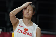 China's Siyu Wang (5) bleeds from her head after colliding with Australia's Katie Ebzery during a women's basketball preliminary round game at the 2020 Summer Olympics in Saitama, Japan, Friday, July 30, 2021. (AP Photo/Charlie Neibergall)