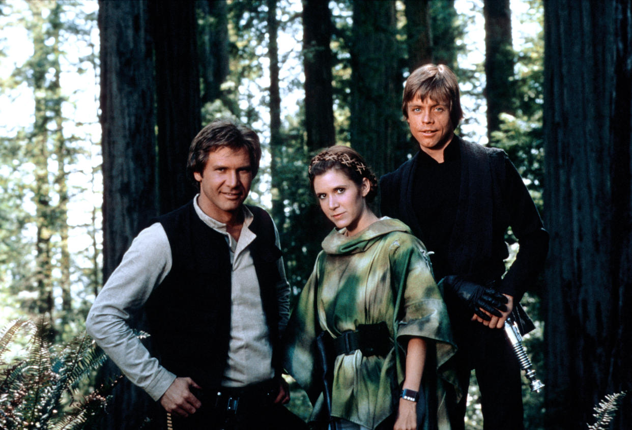 Harrison Ford, Carrie Fisher and Mark Hamill on the set of Return of the Jedi